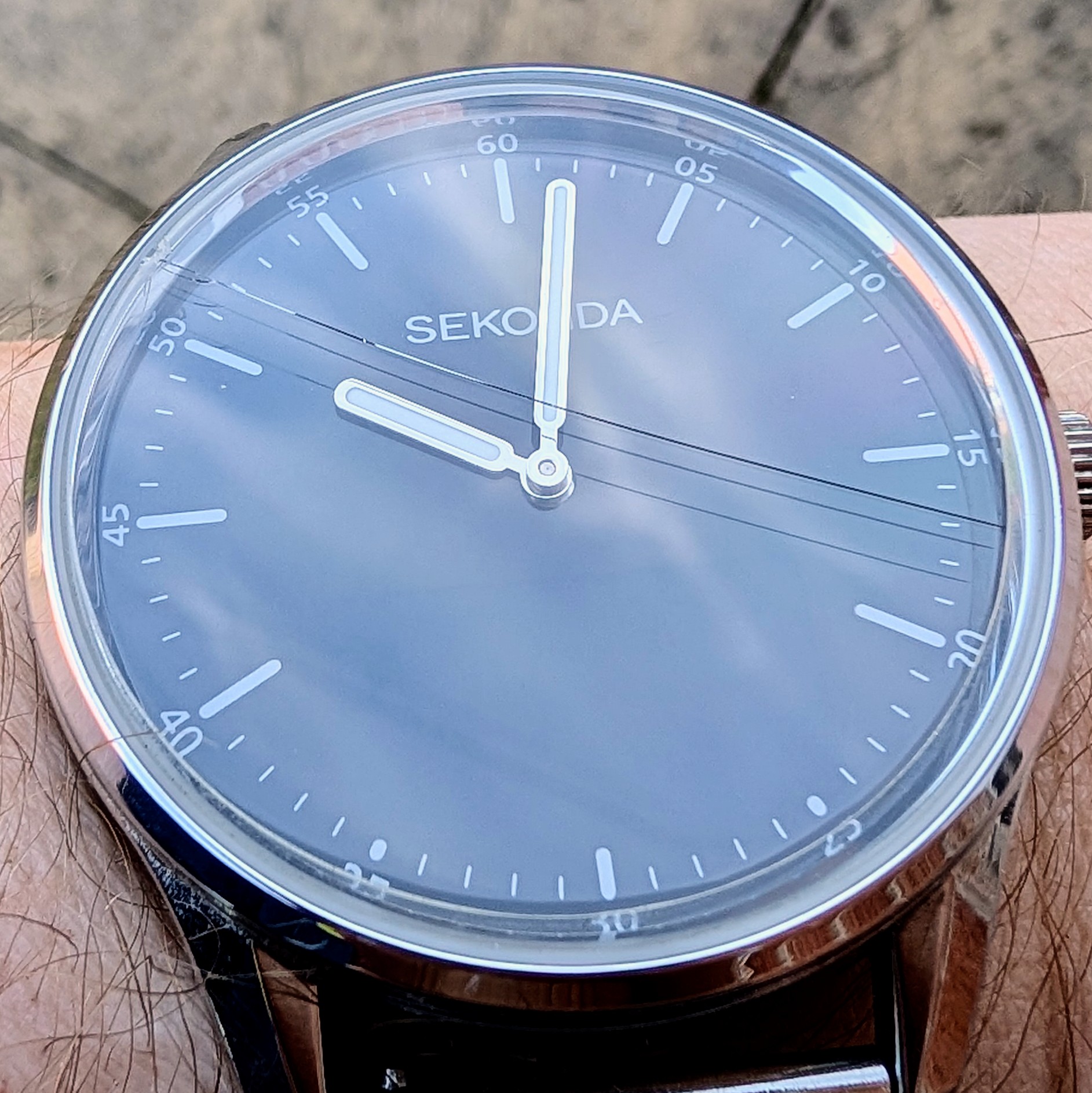 Watch with a crack right across the glass